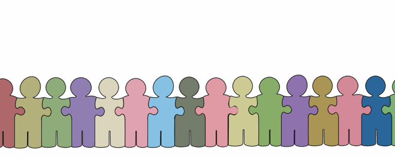 Sagome colorate a incastro su sfondo nero, simbolo di unità e diversità